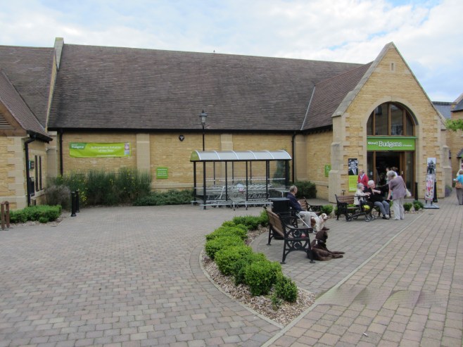 Shopping at Budgen's Grocery in Broadway, UK
